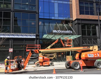 CHICAGO, ILLINOIS - APRIL 28, 2018: Union Construction Workers Complete Entrance To New 110 N Carpenter Street McDonalds Headquarter Building In West Randolph Neighborhood.