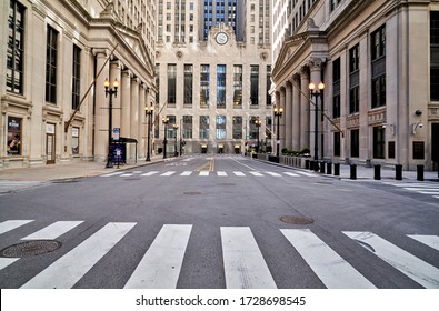 Chicago Illinois, – April 3rd 2020: Corner Of LaSalle & W. Adams St.: Chicago Loop Ghost-town Appearance; No Cars, & No People On The Street – Prompted By Covid-19 Restrictions.         