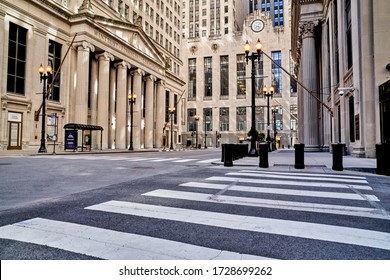 Chicago Illinois, – April 3rd 2020: Corner Of LaSalle & W. Adams St.: Chicago Loop Ghost-town Appearance; No Cars, & No People On The Street – Prompted By Covid-19 Restrictions.                      