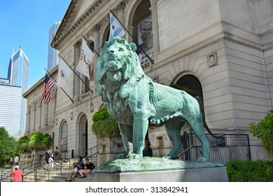 CHICAGO, ILLINOIS - AUGUST 22, 2015: Lion Statue. The Statue Is One Of A Pair Of Bronze Lions By Sculptor, Edward Kemeys, That Flank The Main Entrance Of The Art Institute Of Chicago.