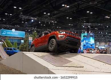 CHICAGO, ILLINOIS - February 8, 2020: Red Jeep Compass during a breakover test drive at McCormick Place at the annual Chicago Auto Show 