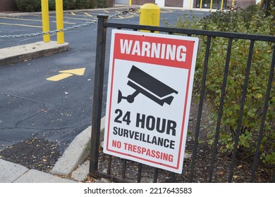 CHICAGO, ILLINOIS - OCTOBER 21, 2022: Vacant Retail Store Parking Lot Gate Security Warning Signage On Exterior In River North Neighborhood October 21, 2022