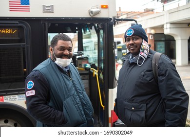 Chicago, Illinois / United States - 04 01 2020: CTA Bus Drivers in masks taking a break near Foster and Broadway