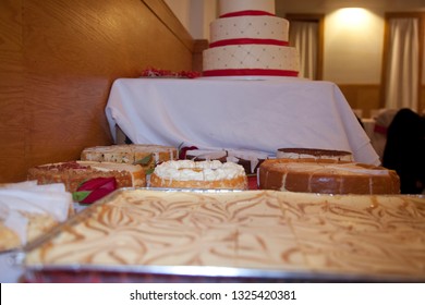 Chicago Illinois/ United States December 16th 2016:  Young Girl Is Having Her Quinceanera Celebration As The Family Is Perparing To Honor This Happy Occasion With Cake