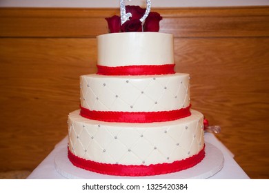 Chicago Illinois/ United States December 16th 2016:  Young Girl Is Having Her Quinceanera Celebration As The Family Is Perparing To Honor This Happy Occasion With With Cake