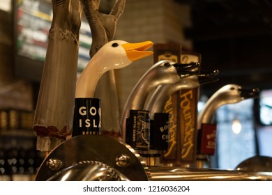 Chicago, Illinois, United States - October 7, 2018: Goose Island beer tab handles at Goose Island Beer Company tasting room located on 1800 W Fulton Street.
