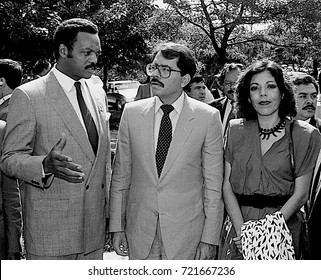 Chicago Illinois, USA, 2nd August, 1986
Nicaraguan President Daniel Ortega His Wife Rosario Murillo  With The Reverend Jesse Jackson Outside Operation Push Headquarters.