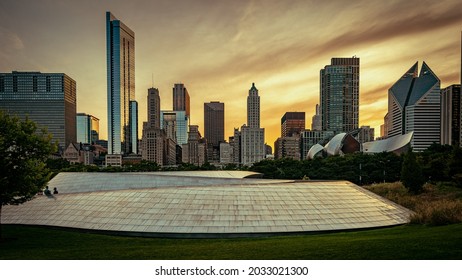 Chicago, Illinois, USA - Aug 15, 2019: City View With BP Pedestrian Bridge At Sunset