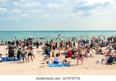 Chicago, Illinois, USA - August 16, 2014: People Enjoying Summer Time At The Popular North Avenue Beach On The Lake Michigana In Chicago.