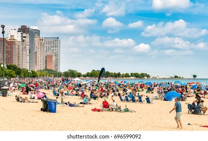 Chicago, Illinois, USA - August 16, 2014: People Enjoying Summer Time At The Popular North Avenue Beach On The Lake Michigan In Chicago.