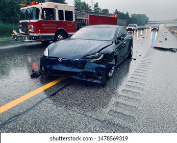 Chicago, Illinois / USA August 5th 2019 : Photograph of a Tesla model 3 that got into an accident on the highway.
