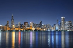 Chicago, Illinois, USA Downtown Skyline From Lake Michigan At Dusk.