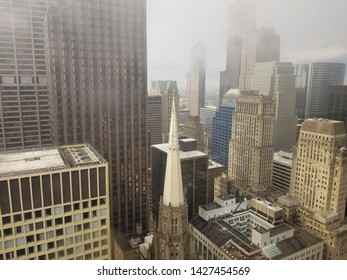 Chicago, Illinois / USA - July 18 2018: Shown Here Is An Interesting Atmospheric Shot Of Early Morning Fog From Inside The  Downtown City Hall Building.