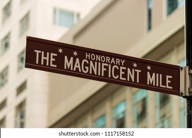 CHICAGO, ILLINOIS, USA - JUNE 14, 2018: Chicago's Magnificent Mile Street Sign Along Michigan Avenue. The Area Is The City's Premier Shopping Destination.