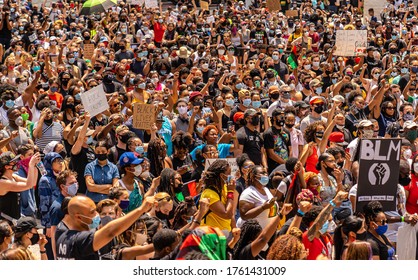 Chicago, Illinois / USA - June 19 2020. Large Crowd At A Peaceful Protest Rally In Daley Plaza In The Loop Of Downtown Chicago Over George Floyd Death On Juneteenth. Police And Protesters.