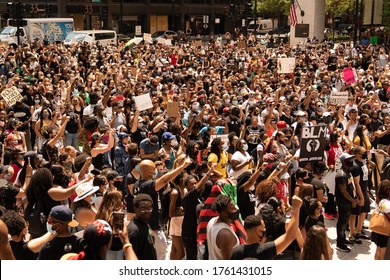 Chicago, Illinois / USA - June 19 2020. Large Crowd At A Peaceful Protest Rally In Daley Plaza In The Loop Of Downtown Chicago Over George Floyd Death On Juneteenth. Police And Protesters.