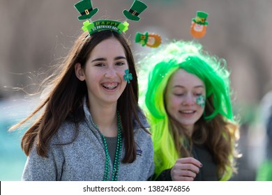 Chicago, Illinois, USA - March 16, 2019: St. Patrick's Day Parade, Young Girls Celebrating  St Patricks During The Parade