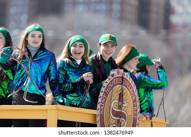 Chicago, Illinois, USA - March 16, 2019: St. Patrick's Day Parade, Members Of Saint Ignatius College Prep Celebrating Saint Patricks During The Parade