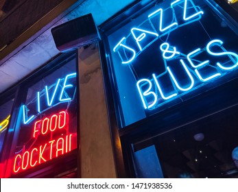 Chicago, Illinois USA. May 10, 2019.  Nightlife With Jazz And Blues Music. Retro Bar With Red And Blue Neon Sign. Food And Coctails