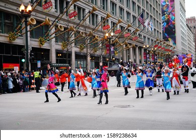 Chicago, Illinois / USA - November 28th 2019: Members of the Wu Zhi Lin Performing arts performers performed on their floats in 2019 Uncle Dan's Chicago Thanksgiving Parade.