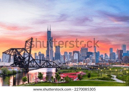 Chicago, Illinois, USA park and downtown skyline at twilight in spring.