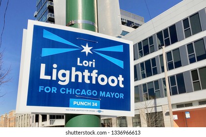 CHICAGO, ILLINOIS/MARCH 12, 2019: Pole Mounted Political Sign Explains Lori Lightfoot For Chicago Mayor During  April 2, 2019 Runoff Election At West Grand And North Green Street