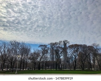 Chicago/ Illinois/USA - April 16, 2019: Cloudy Sky On The South Court Of Presidents' Garden In Chicago. It Is Located In Grant Park, Within The City's Central Business District.