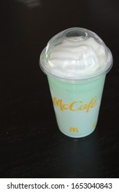 Chicago, Illinois/USA - February 22, 2020: McDonald's Celebrates The 50th Anniversary Of The Green Minty Shamrock Shake Pictured With Lid And Whipped Topping For A Limited Time Only