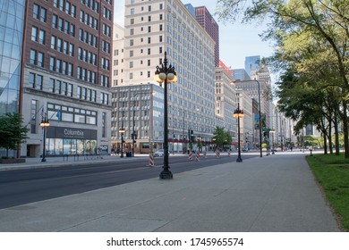 Chicago, IL/USA - May 31, 2020 Downtown Chicago Michigan Avenue Aftermath Of Riots. Empty Streets Boarded Up Storefronts. 