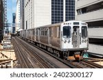 Chicago "L" Elevated Metro rail rapid transit train city public transport near Harold Washington Library station in Chicago, United States