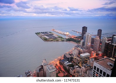 Chicago Navy Pier Aerial View With Lake Michigan At Dusk.