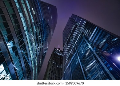 Chicago Night Life. Chicago Illuminated Skyline View At Dusk, United States.  Bottom Up View