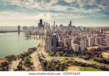 Chicago Skyline aerial view with road by the beach, vintage colors