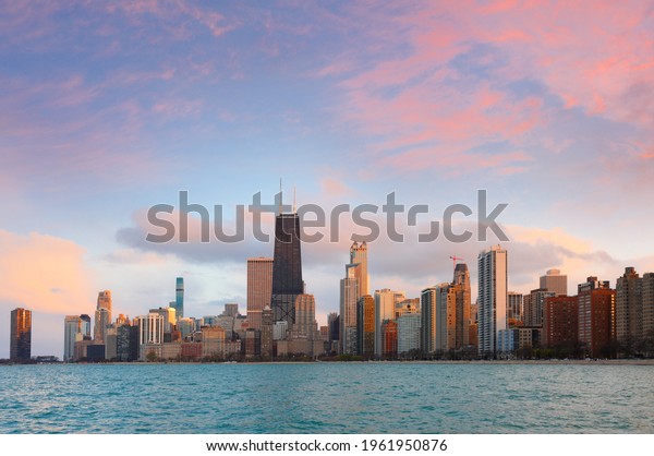 Chicago skyline after sunset\
showing Chicago downtown viewing from North Avenue beach . Chicago,\
on Lake Michigan in Illinois, is among the largest cities in the\
U.S. 