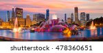 Chicago skyline panorama with skyscrapers and Buckingham fountain at twilight.