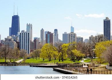 Chicago skyline with skyscrapers viewed from Lincoln Park over lake
