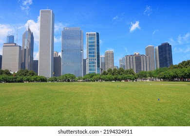 Chicago Skyline Stock Photo With Grant Park Lawn. Downtown Chicago Office Buildings.