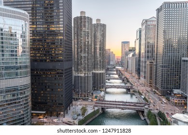 Chicago Skylines Along River Walk At Sunset, Aerial View Of Modern Buildings