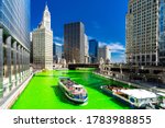 Chicago Skylines building along green dyeing river of Chicago River on St. Patrick