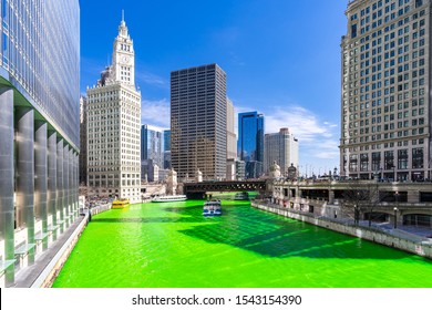 Chicago Skylines Building Along Green Dyeing River Of Chicago River On St. Patrick Day Festival In Chicago Downtown IL USA