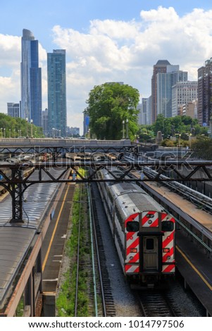 Chicago train with skyline in background