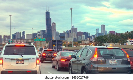 CHICAGO, UNITED STATES - 20 OCTOBER 2016: FPV Stuck In Heavy Traffic On Multiple Lane Highway Towards Iconic Chicago City Skyline. Rush Hour On Busy Jammed Interstate Freeway In Chicago, Illinois USA