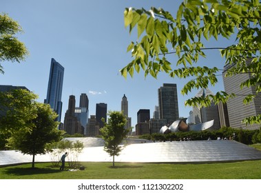 Chicago, USA - June 04, 2018: People On BP Pedestrian Bridge And Chicago Skyscrapers.