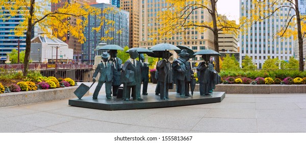 Chicago, USA - November 10, 2019: The Gentlemen Statues Were Created By Ju Ming And Installed In 2015 In The AMA Plaza.