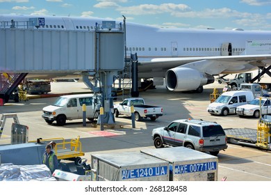 CHICAGO, USA - OCTOBER 11: Airport Ground Service And Maintenance In Chicago International Airport, In October 11th, 2014.Chicago Is The Biggest City In North Of USA.