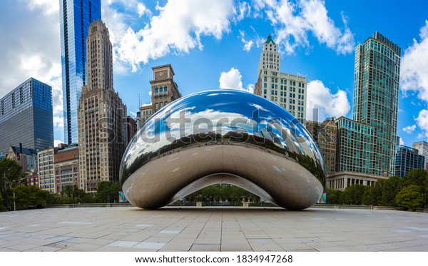 Chicago, USA - October 16, 2020: Cloud Gate is a\
public sculpture by Indian-born British artist Sir Anish Kapoor,\
that is the centerpiece of at Millennium Park in the Loop community\
area of Chicago.
