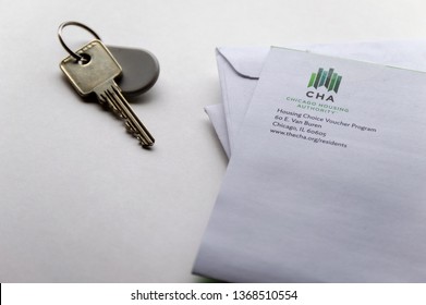 Chicago, USA-April 10, 2019: A Letter From Chicago Housing Authority CHA Is Displayed With A Door Key And Key Fob. Public Housing Assistance Program.