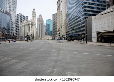 Chicago,IL/USA-March 24th 2020: Streets Of Downtown Chicago Around State Street And Michigan Ave Are Completely Isolated, Desolated, Empty  Due The National Health Pandemic Covid-19 