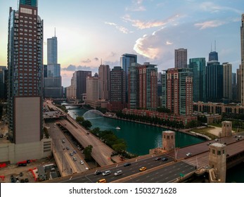 Chicago,IL/USA-September 11th 2019: Aerial Drone Footage Of The Downtown Chicago Skyline During Sunset.  The City Architecture Shows The Beautiful Chicago River And Skyscrapers As Tourist Travel 