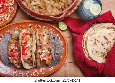 Chicharrones In A Green Sauce Tacos Served With Pico De Gallo Salad. Typical Mexican Food.